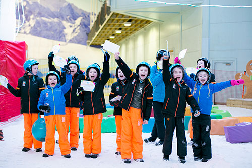 Group of children having fun on snow