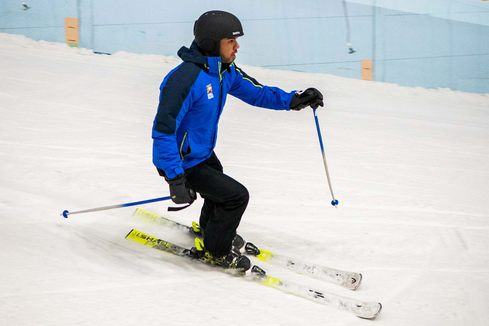 Skier skiing down the slope at Chill Factor<sup>e</sup>
