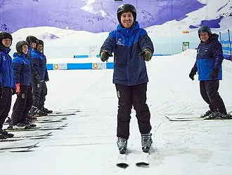 Group of beginner skiers on a lesson