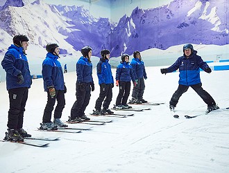 Beginner skiers taking part in a lesson at Chill Factor<sup>e</sup>