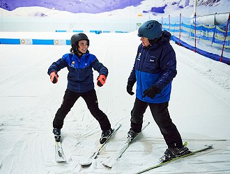 Skier skiing down beginner slope at Chill Factor<sup>e</sup>