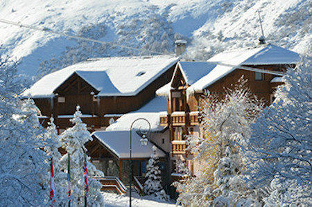 Alpine chalet in snow scene