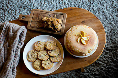 Alpine biscuits and cake on a wooden board